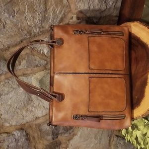 Brown hand bag with metal details
